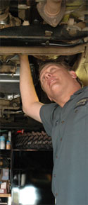 David fixing a car